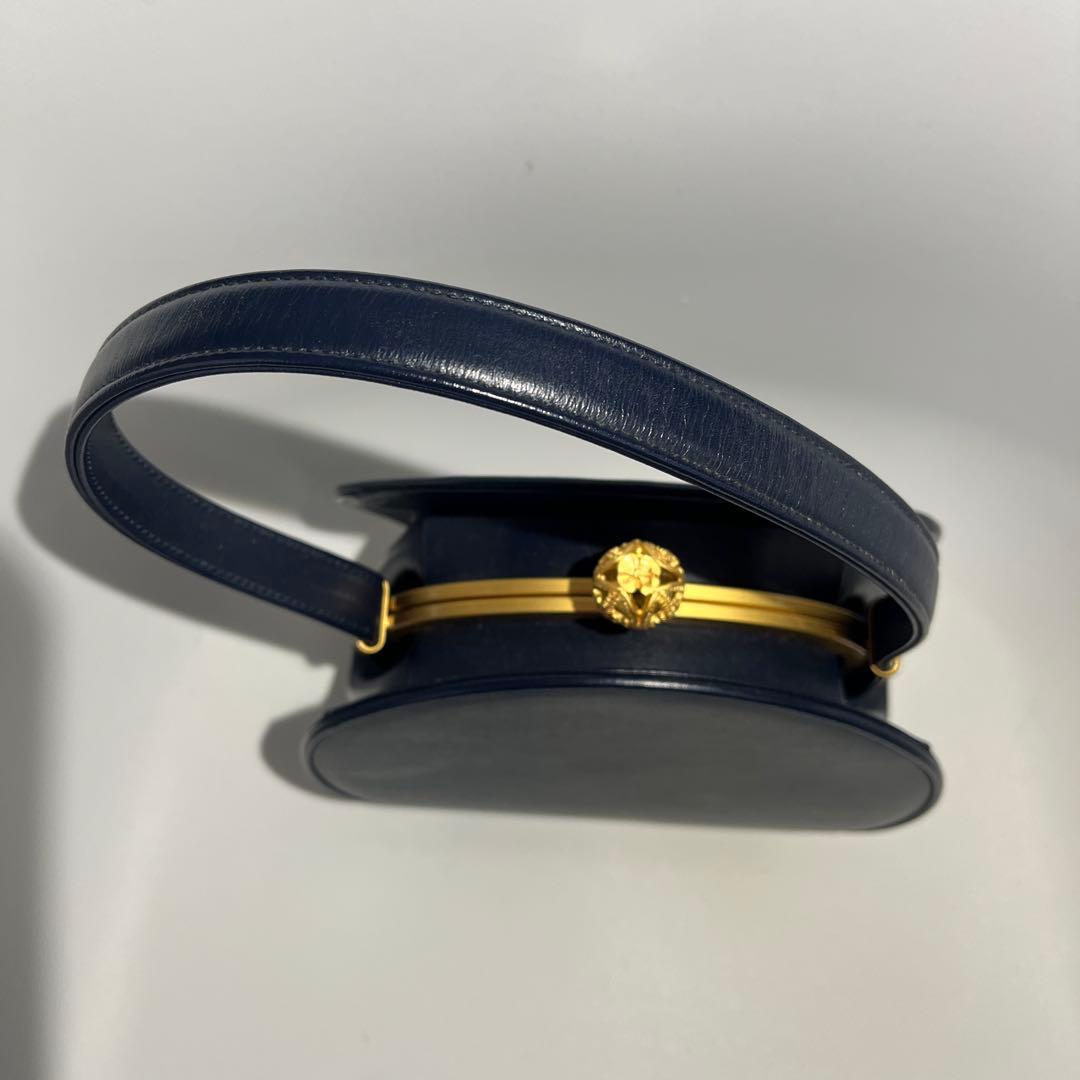 Mila schon ミラショーン 丸型 パーティーバッグ レザー 巾着