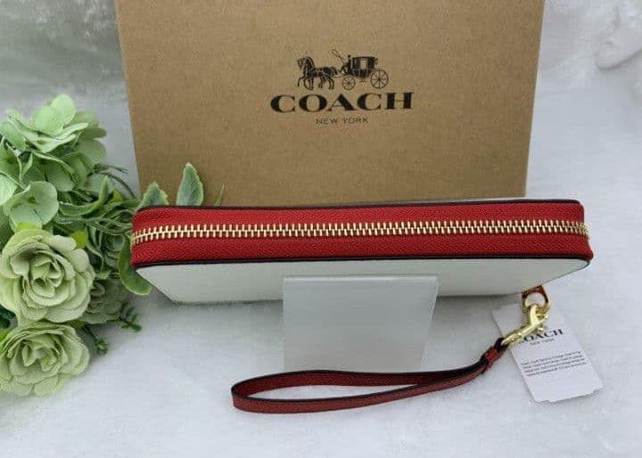 新品未使用コーチ長財布ディズニーミッキーマウスジップホワイト送料無料即日発送