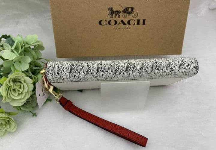 新品未使用コーチ長財布ディズニーミッキーマウスジップホワイト送料無料即日発送