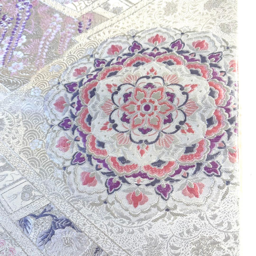 5k2780 袋帯　絹　唐織　プラチナ箔　正倉院文様　華文　銀色　白　ピンク　紫
