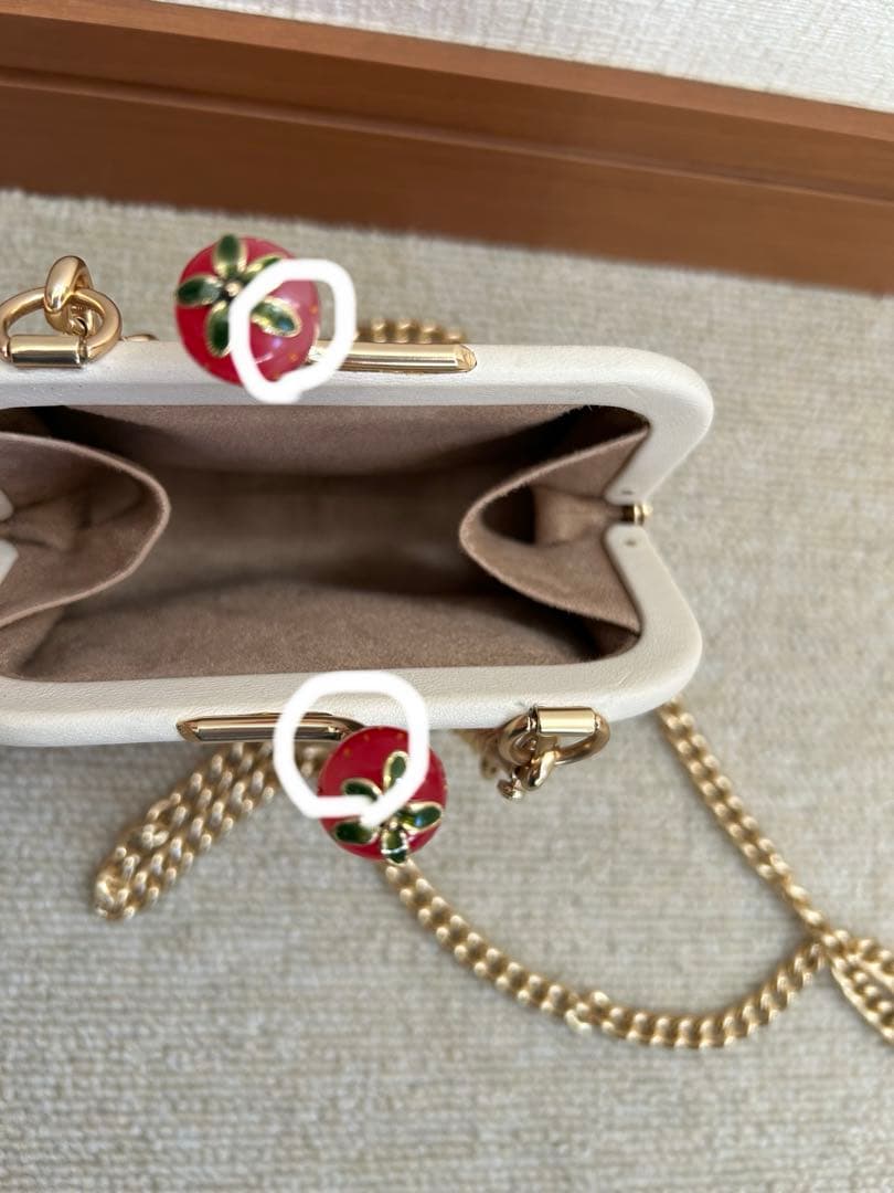 COACHコーチ 財布 がま口 ノラキスロックケース いちご