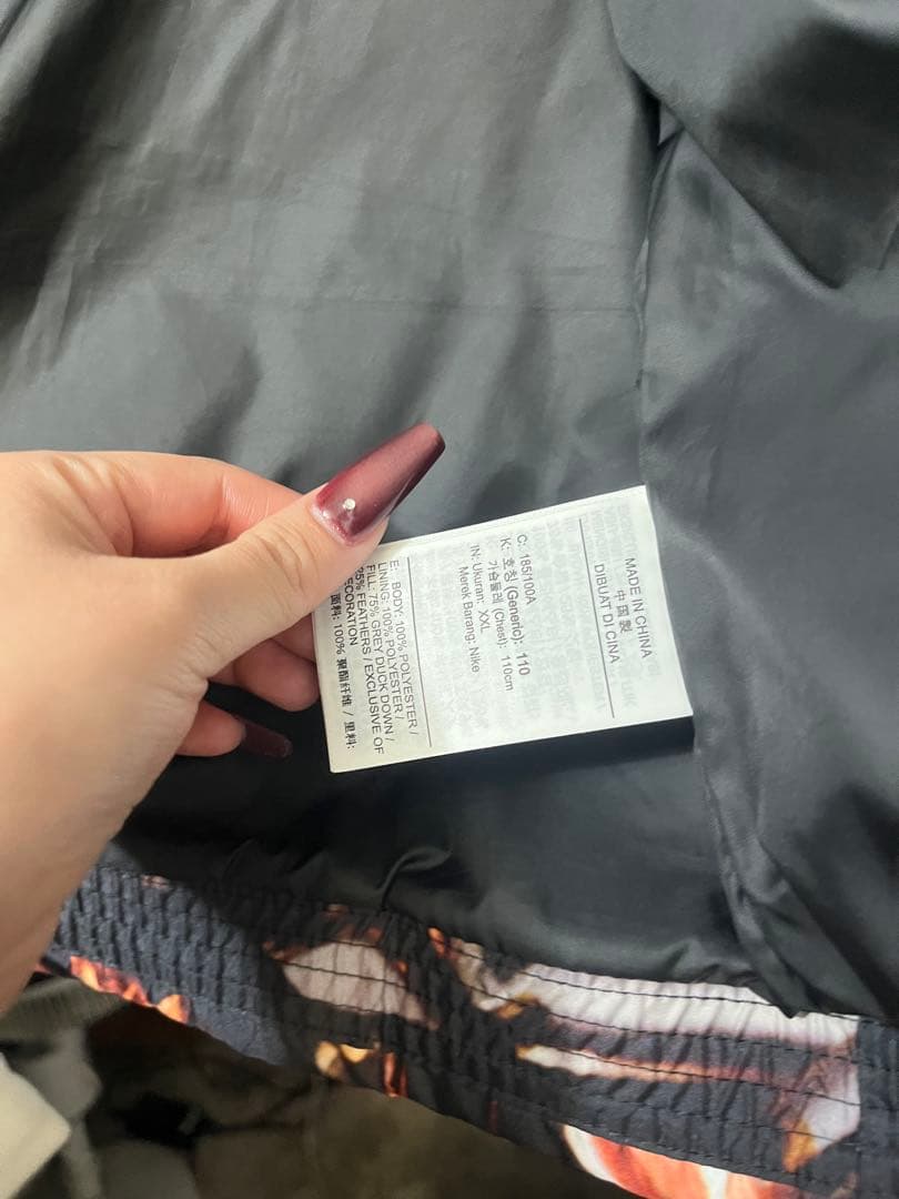 Nike グラフィックダウンベスト