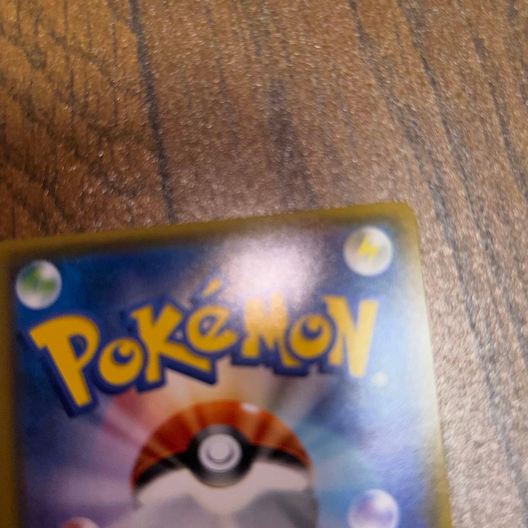 ポンチョを着たイーブイ（ブラッキー） PROMO SM-Pプロモカード