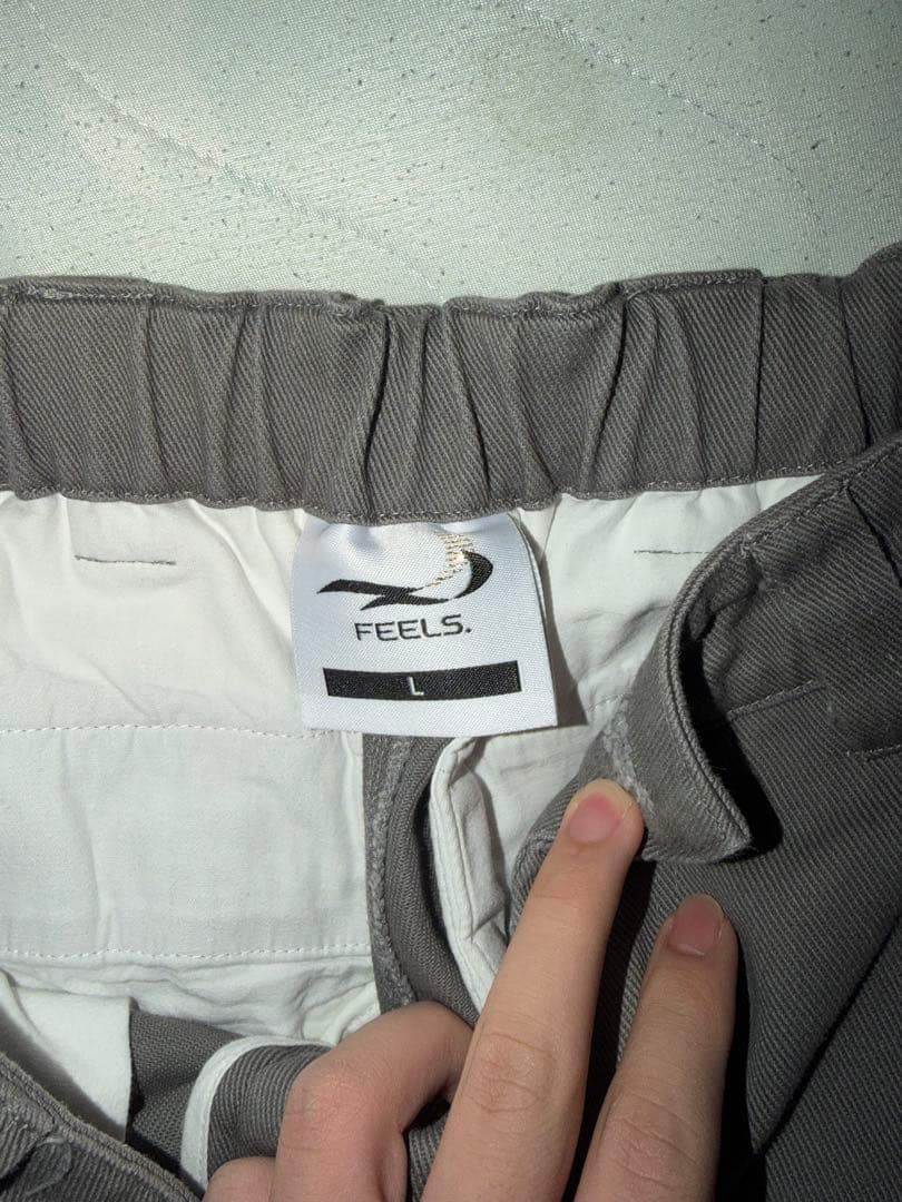 パンツ FEELS WIDE TUCKED TROUSERS GRAY