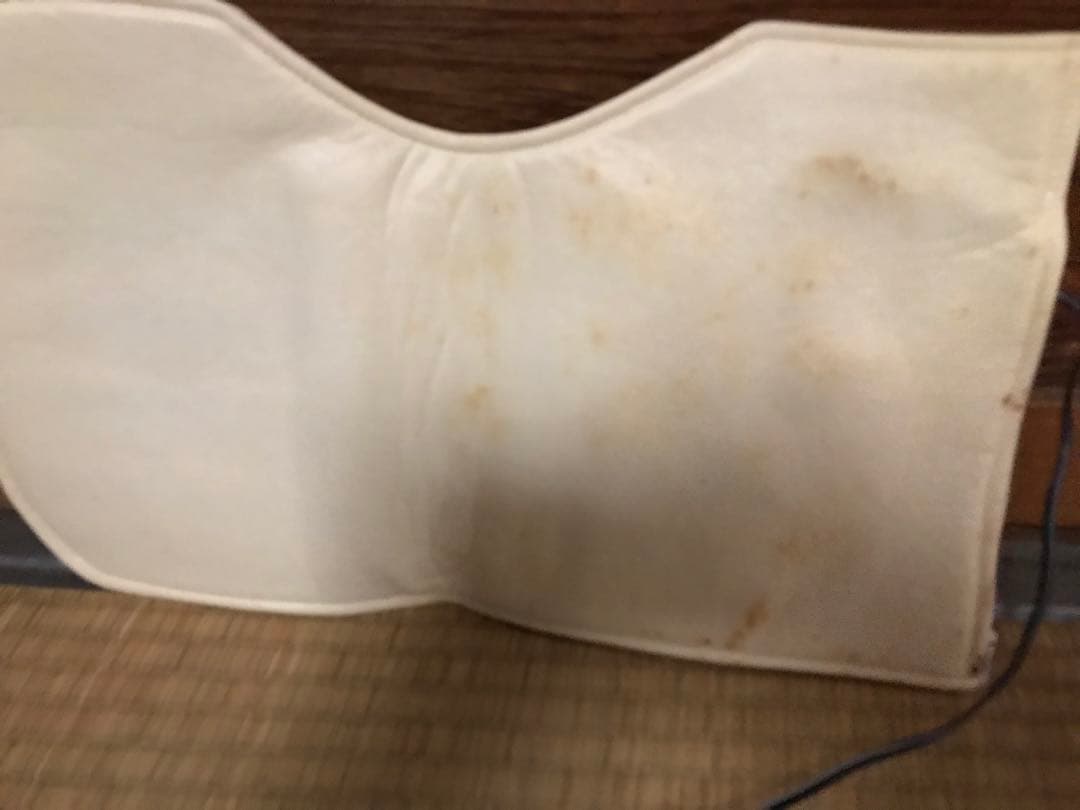 遠赤外線温熱ベルト　パーマクリストとヒマシ油冊子(本体のビニール部にシミあり)