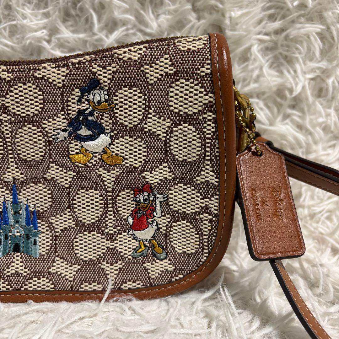 ✨極美品/50周年限定品✨コーチ×ディズニー スゥインガーバッグ ターンロック