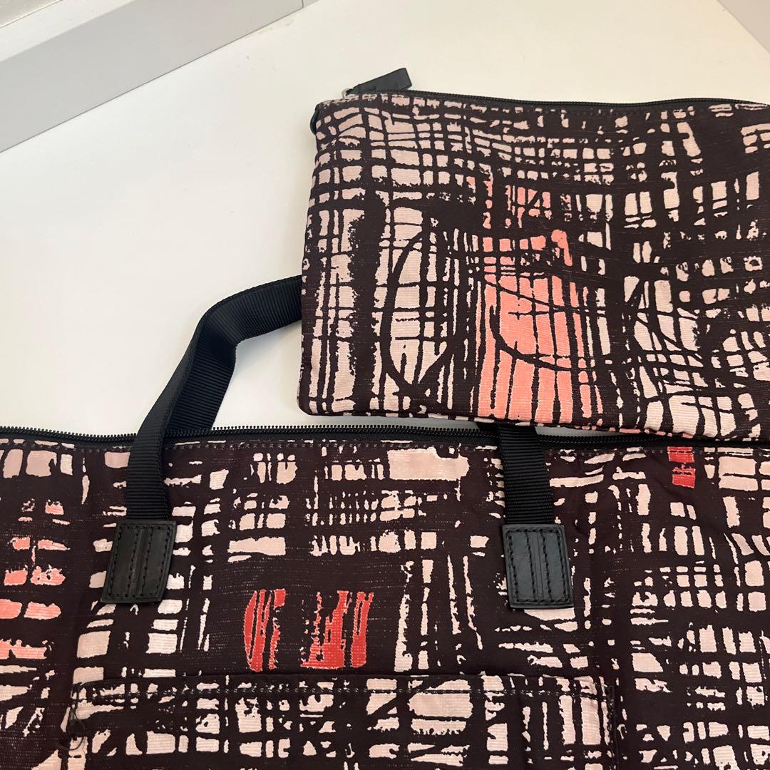 used・TUMI折畳みボストンバッグ・背にループ付き