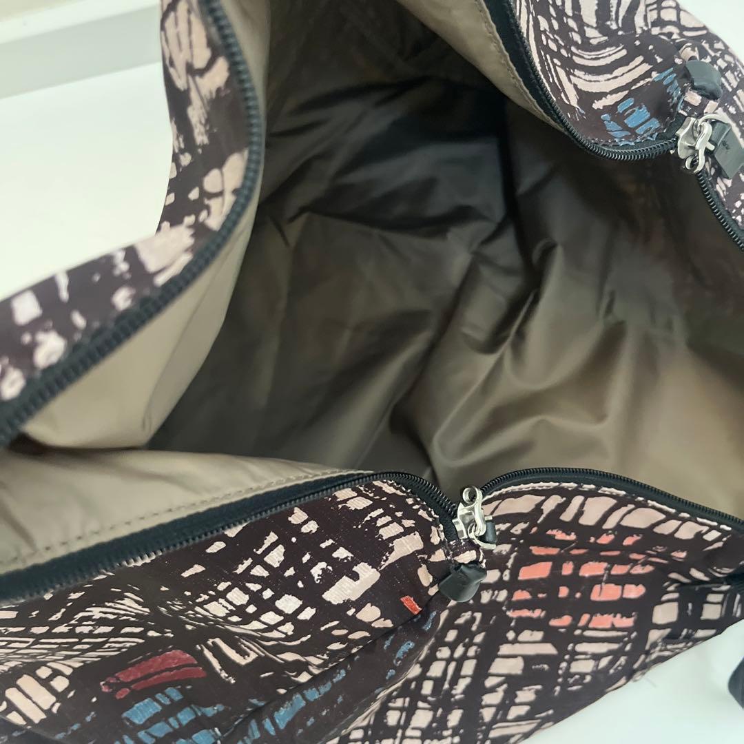 used・TUMI折畳みボストンバッグ・背にループ付き