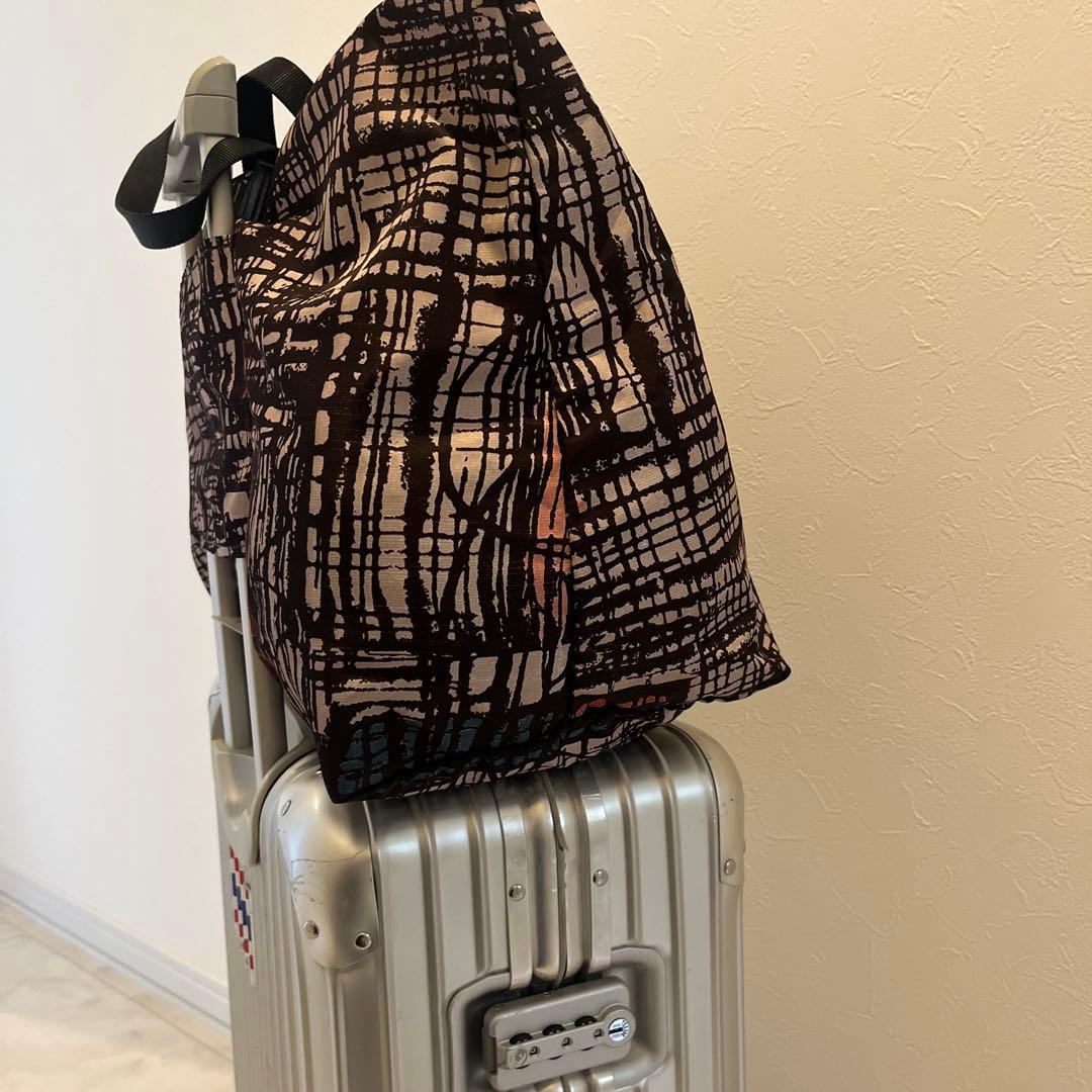 used・TUMI折畳みボストンバッグ・背にループ付き