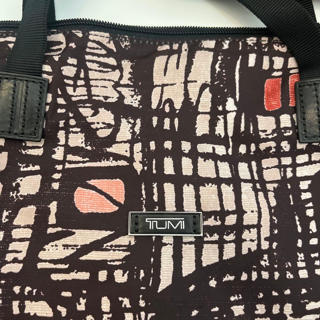used・TUMI折畳みボストンバッグ・背にループ付き