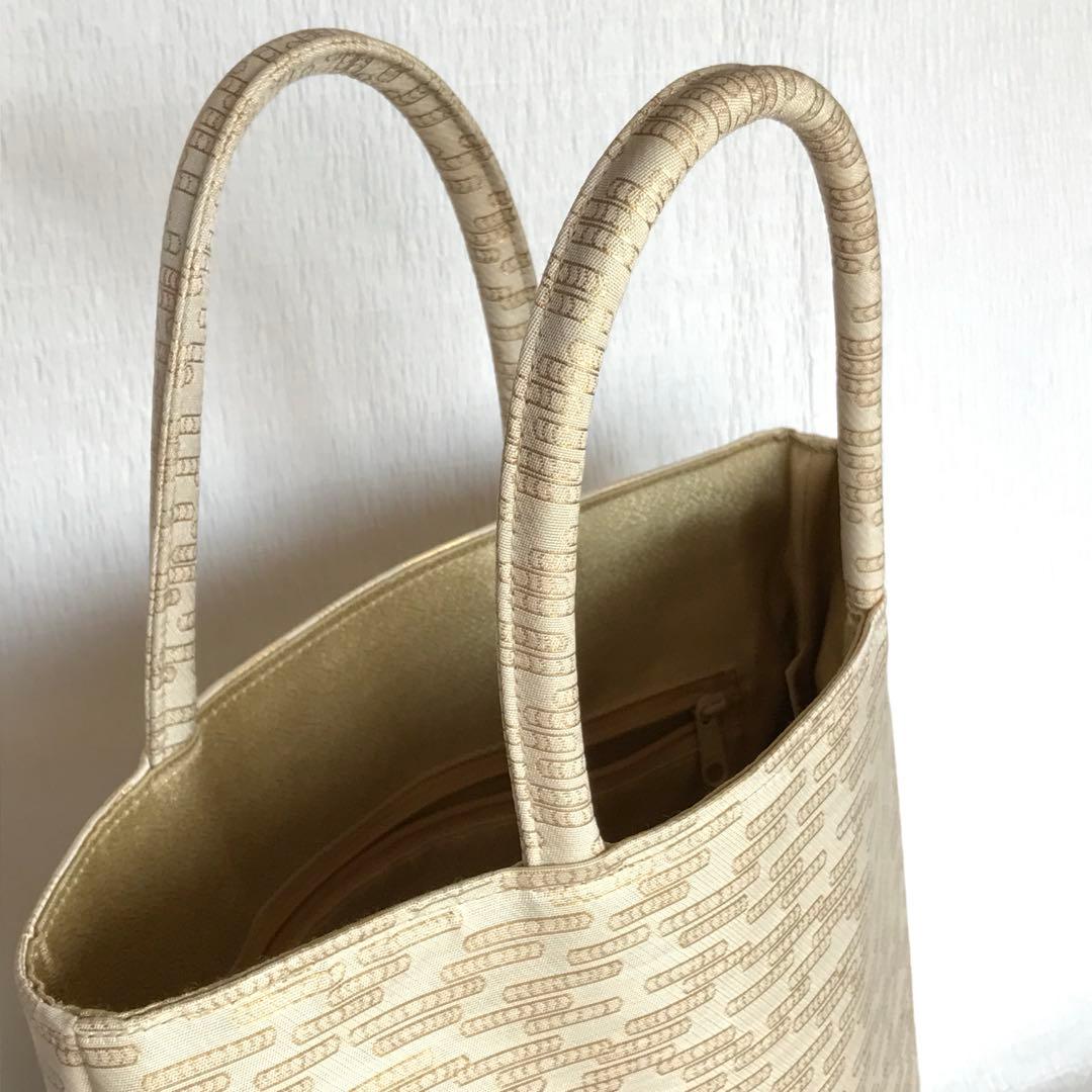 美品　伊と忠　金襴サブバッグ　観世水柄
