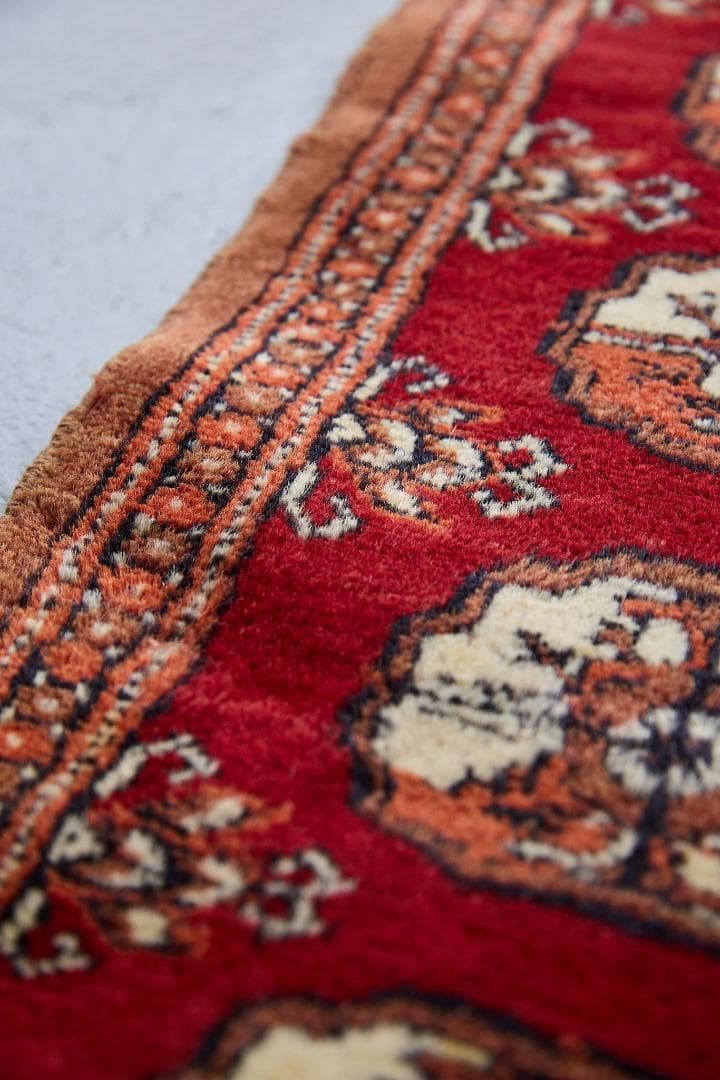 ヴィンテージラグ　トライバルラグ　パキスタン（95×33cm）赤　茶　オレンジ