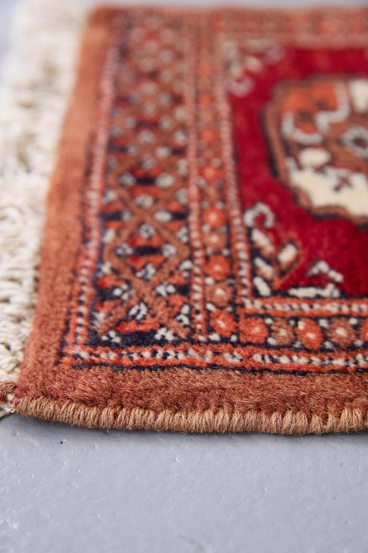 ヴィンテージラグ　トライバルラグ　パキスタン（95×33cm）赤　茶　オレンジ