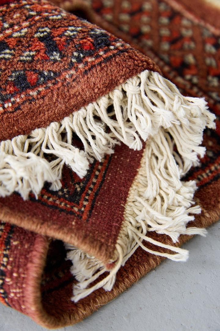 ヴィンテージラグ　トライバルラグ　パキスタン（95×33cm）赤　茶　オレンジ