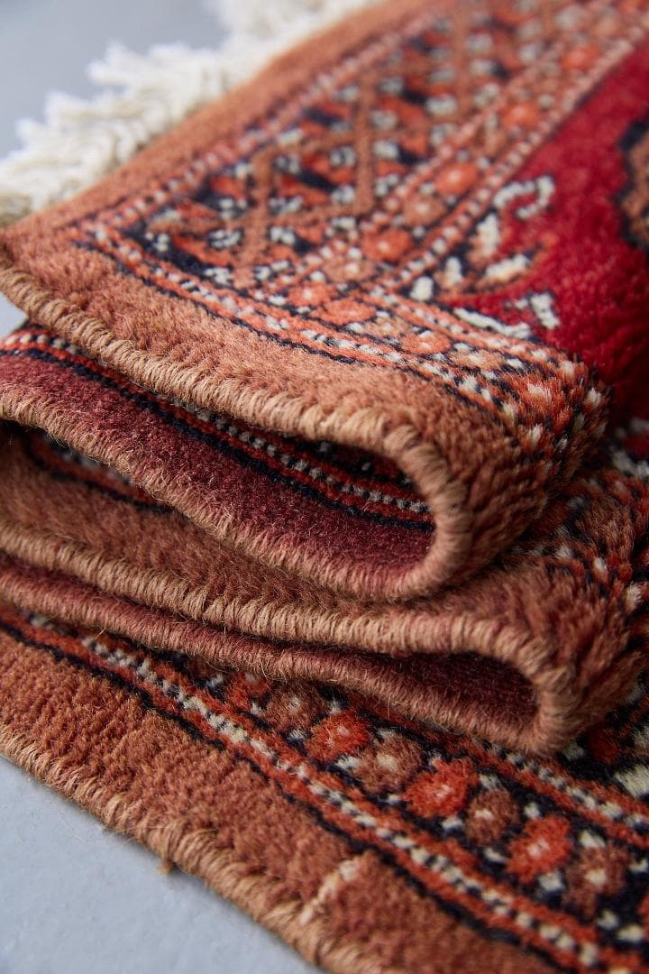 ヴィンテージラグ　トライバルラグ　パキスタン（95×33cm）赤　茶　オレンジ