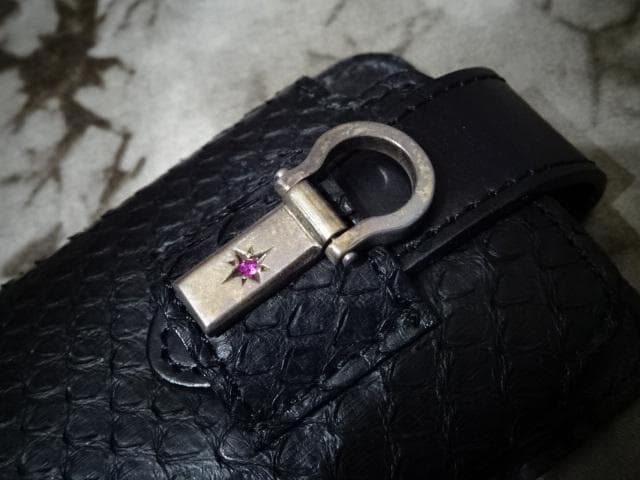 新品!!(定価33000)バックラッシュ・オイルパイソン iphoneケース