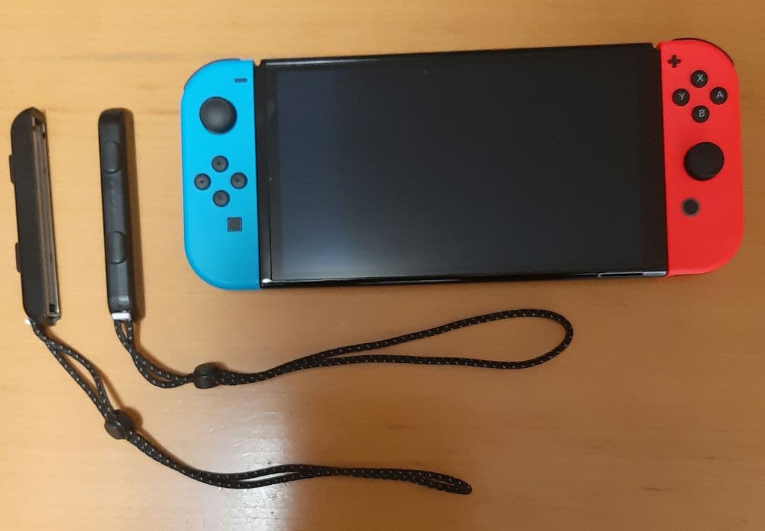 Switch本体有機EL JCネオン(ソフトsports　レッグバンド付き)