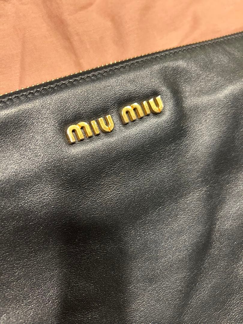 ミュウミュウ　スタッズ　クラッチバック