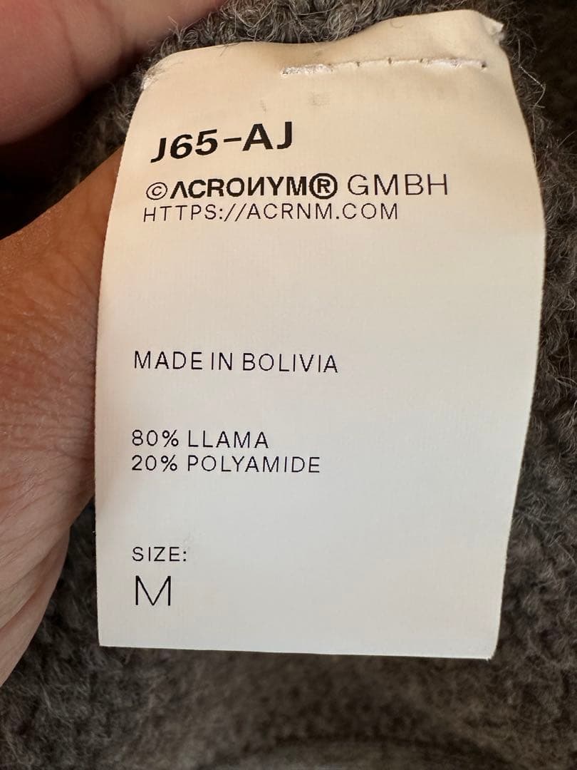 ACRONYM（アクロニウム） ジップアップ半袖ニットベスト