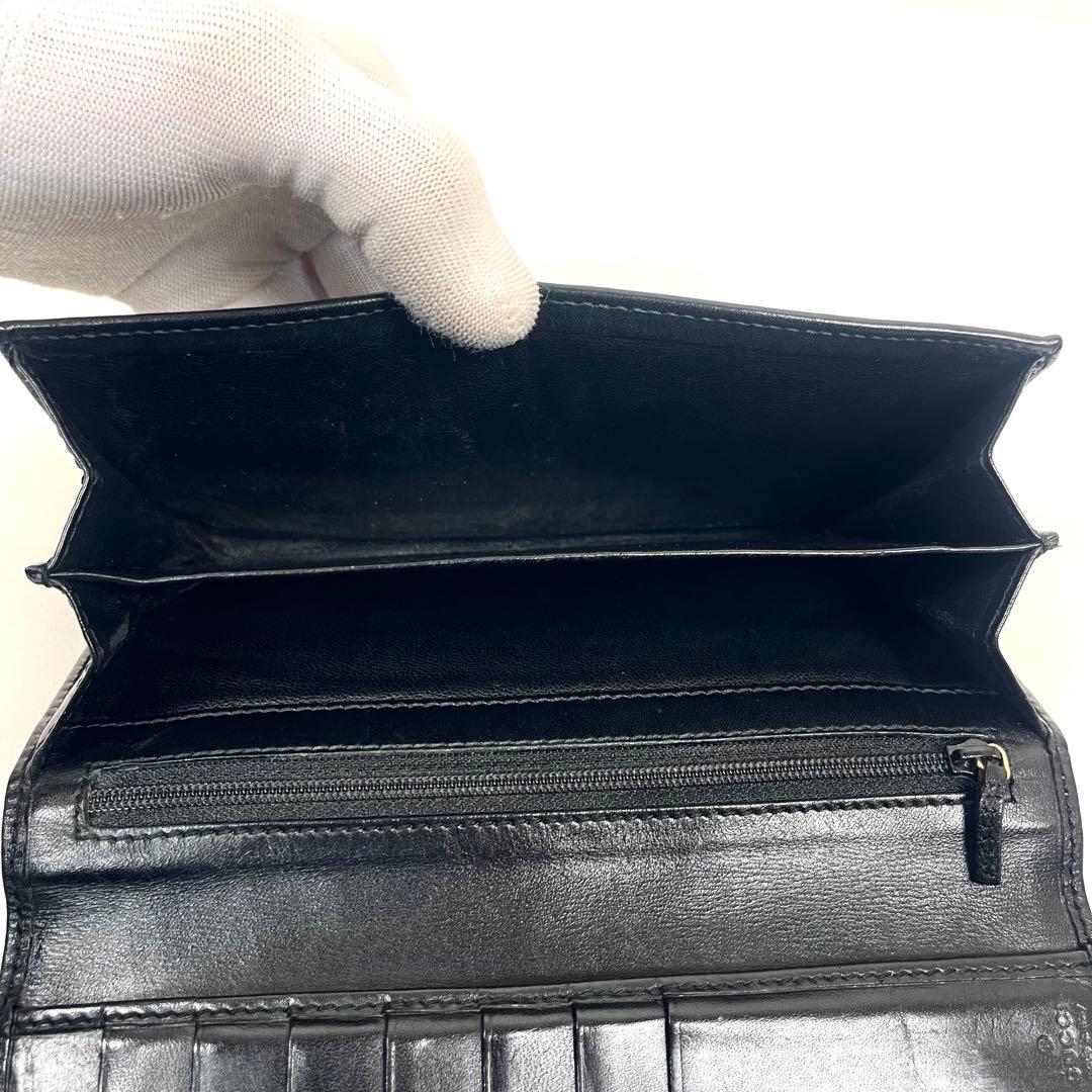 グッチ　長財布　スタッズ　GGキャンバス　総柄　ロゴ型押し　レザー　ブラック