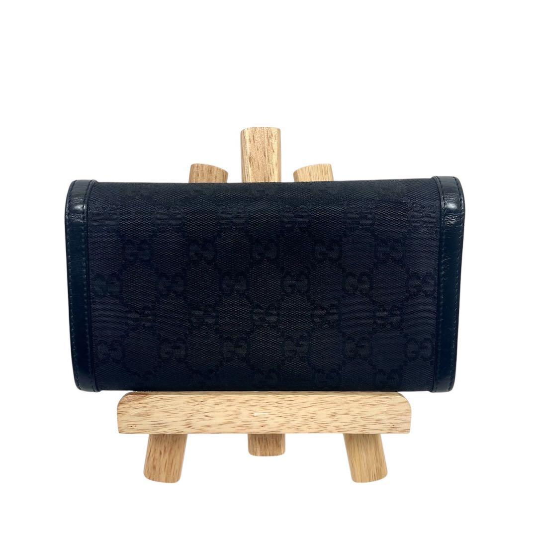 グッチ　長財布　スタッズ　GGキャンバス　総柄　ロゴ型押し　レザー　ブラック