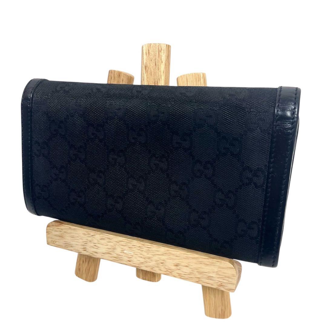 グッチ　長財布　スタッズ　GGキャンバス　総柄　ロゴ型押し　レザー　ブラック