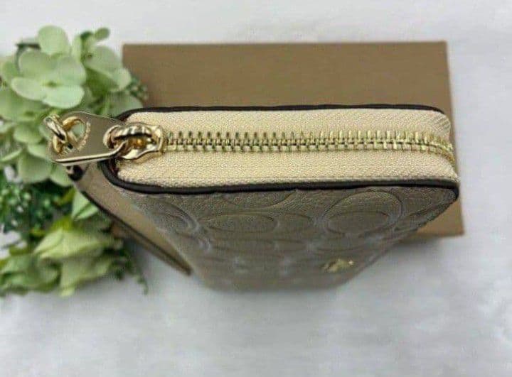 新品未使用コーチ長財布ロゴシグネチャーホワイトレディースメンズ送料無料即日発送