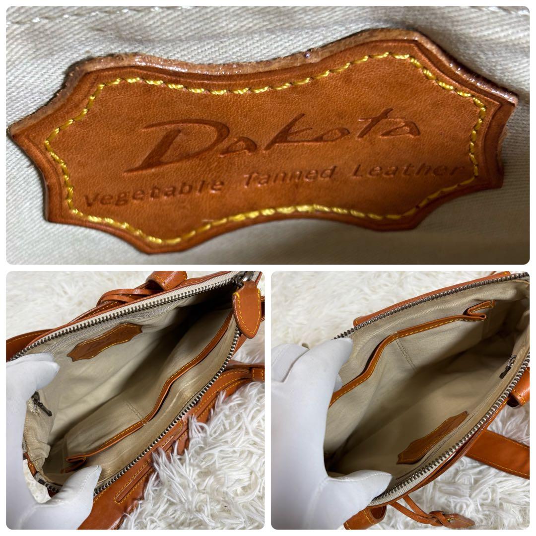 ダコタ ボディバッグ 斜め掛け 肩かけ ロゴ型押し ヌメ革 ベルト ユニセックス