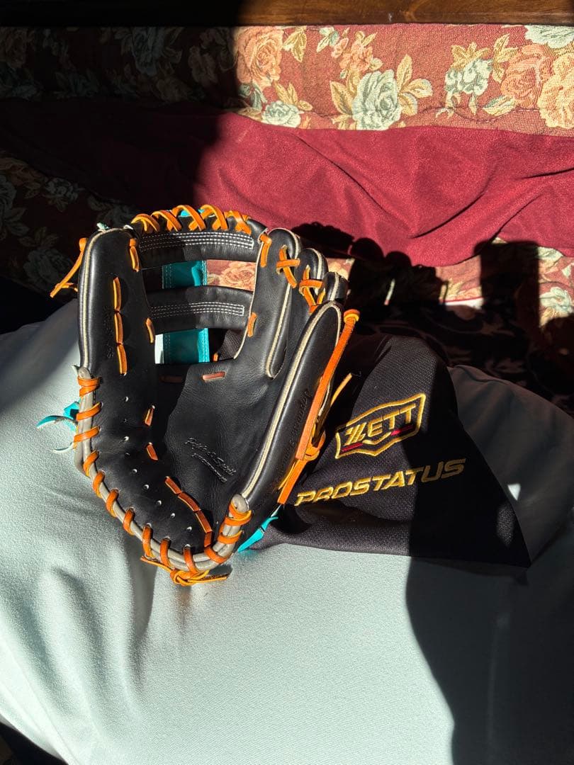 ZETT PROSTATUS 軟式グローブ 黒/青/オレンジ