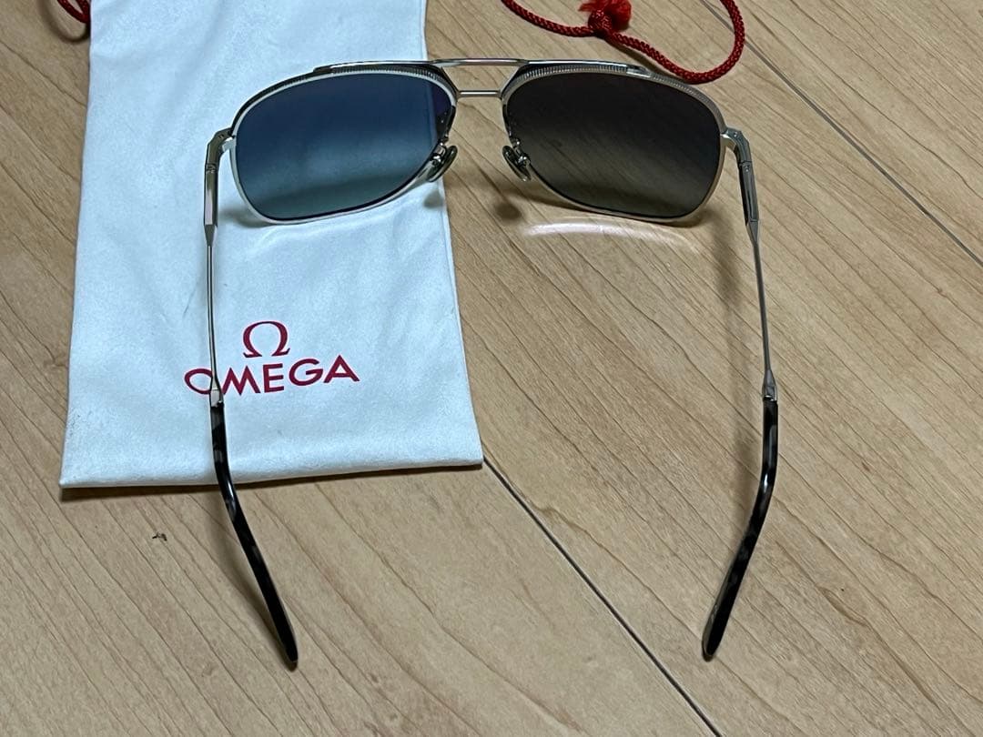 オメガ　サングラス