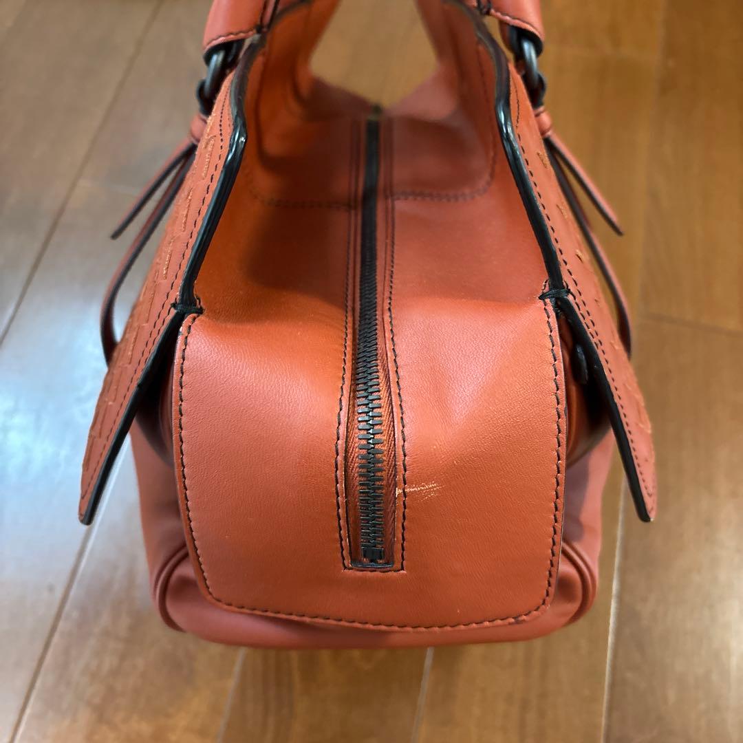 オレンジ レザー 編み込み バッグ