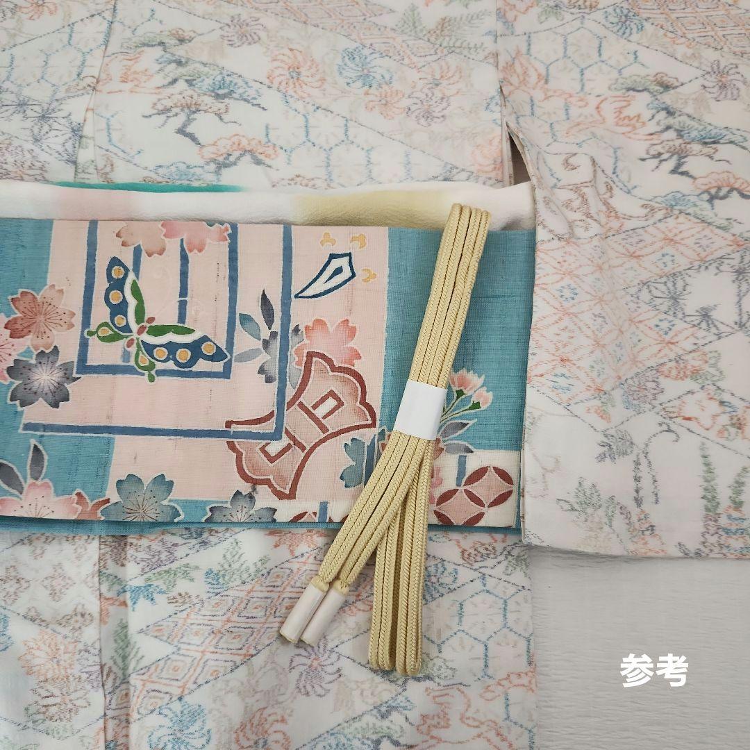 美品　縦節紬　やわらかな春色　松皮菱取吉祥四季花紋　真綿系