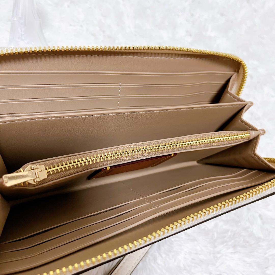 COACH X PEANUTS ロングジップアラウンドウォレット スヌーピー新品