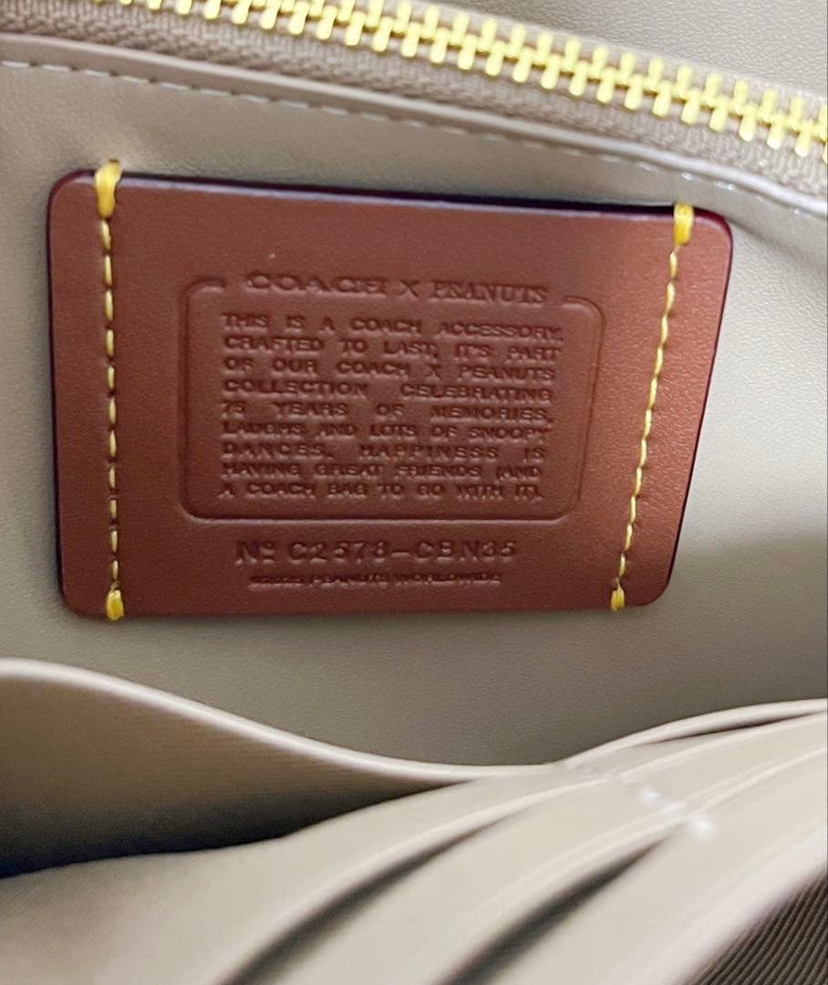 COACH X PEANUTS ロングジップアラウンドウォレット スヌーピー新品