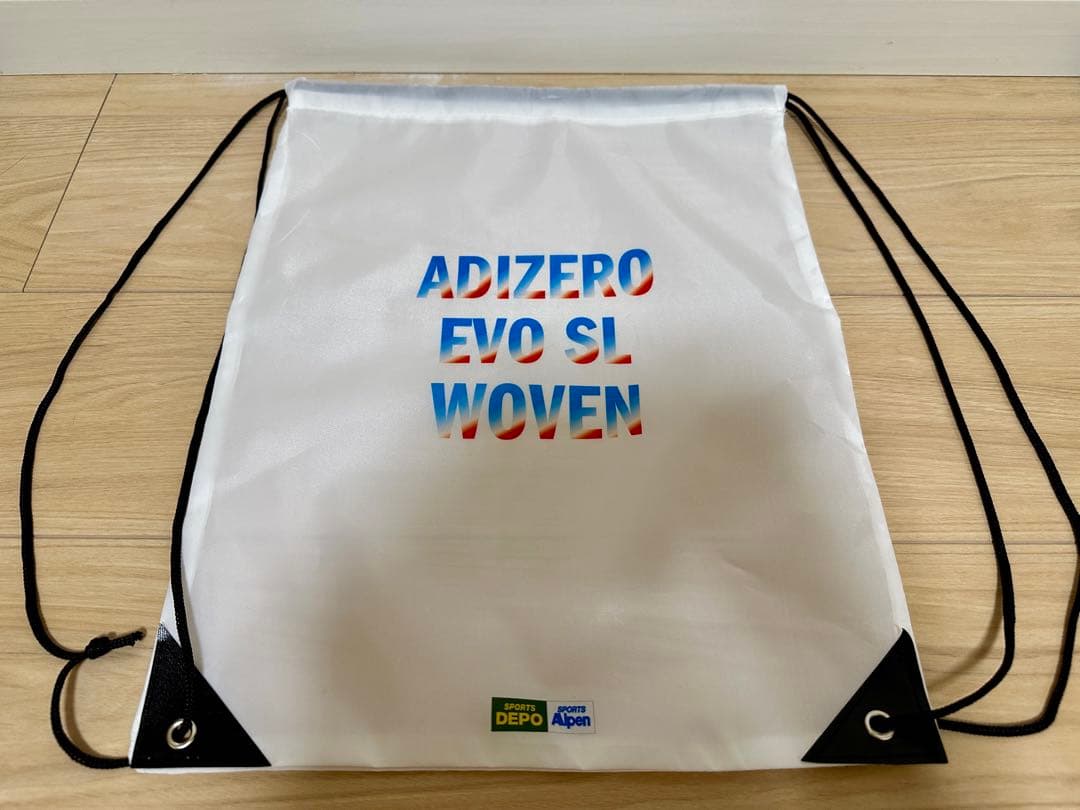 ADIZERO EVOSL Woven 25.0ホワイト/ブルー