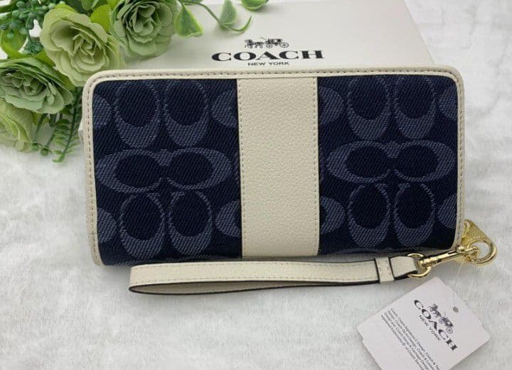 新品未使用コーチ長財布ネイビーホワイトシグネチャーレディースメンズ送料無料