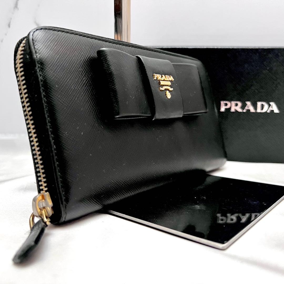 ◇美品◇プラダ　サフィアーノレザー長財布　ロゴ金具　リボンデザイン　ブラック