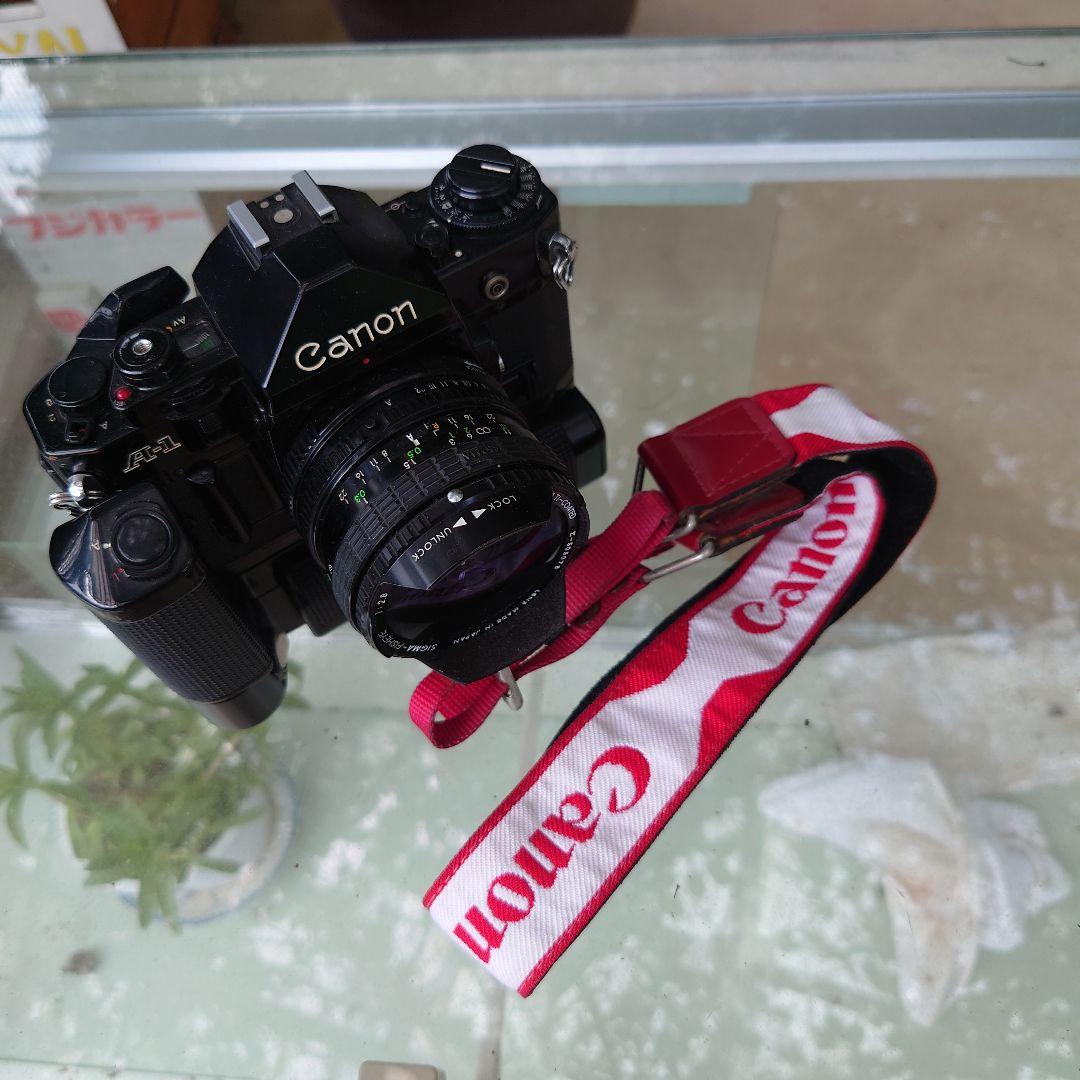 CanonA-1  フィルムカメラ　モータードライブ　シグマ16mmレンズ付き