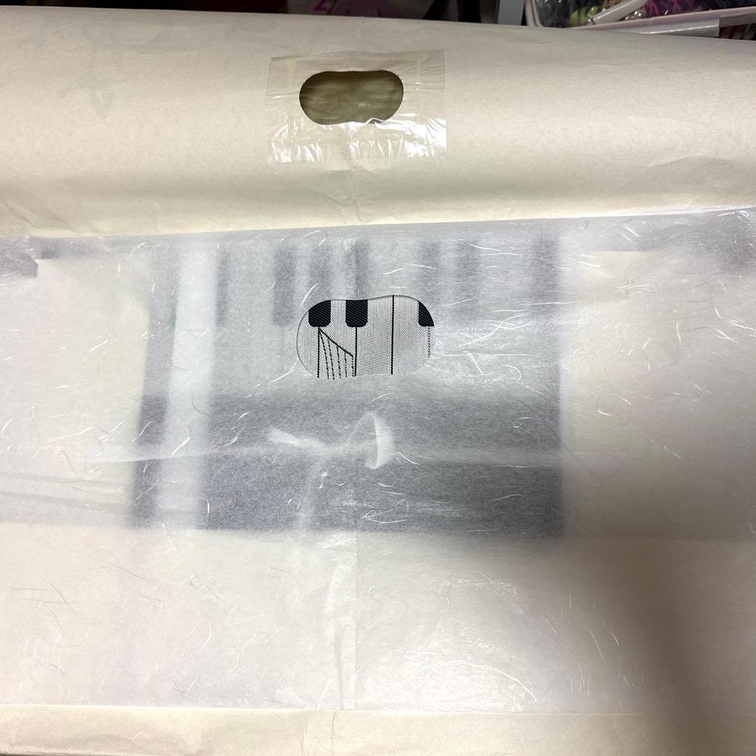 仕立上がり九寸六通名古屋帯　黒地　ピアノ　鍵盤　カラフル　音符　未使用品