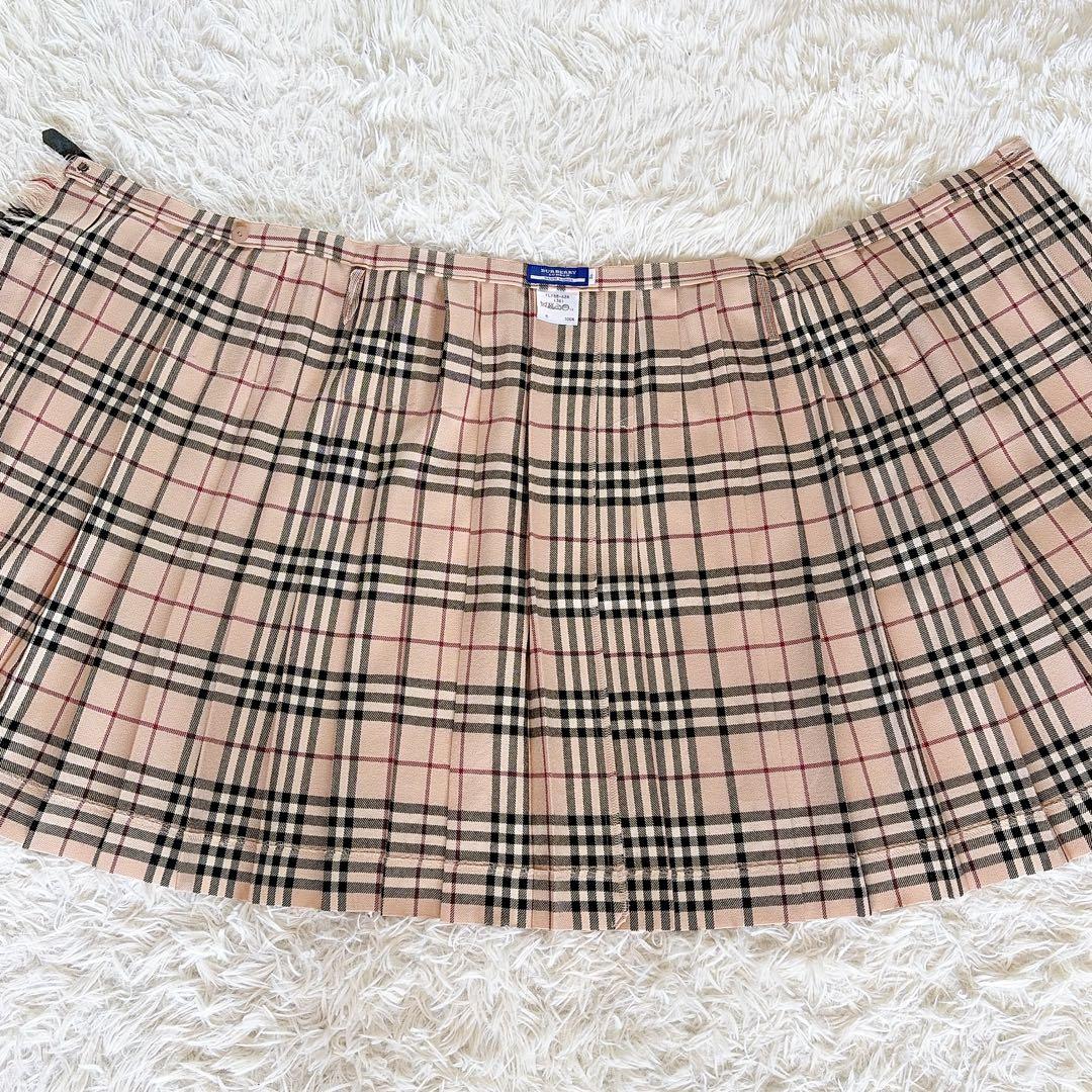 【バーバリーブルーレーベル】ベルトラッププリーツスカート フリンジ ノバチェック