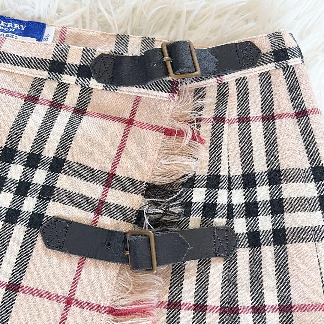 【バーバリーブルーレーベル】ベルトラッププリーツスカート フリンジ ノバチェック