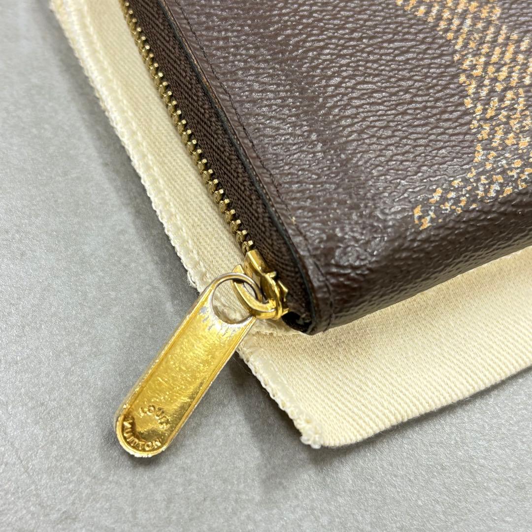 YUNO　ジャイアントモノグラム ジッピーケース M69354