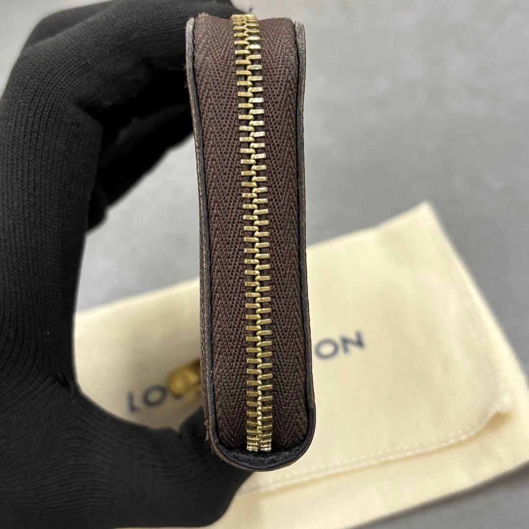 YUNO　ジャイアントモノグラム ジッピーケース M69354