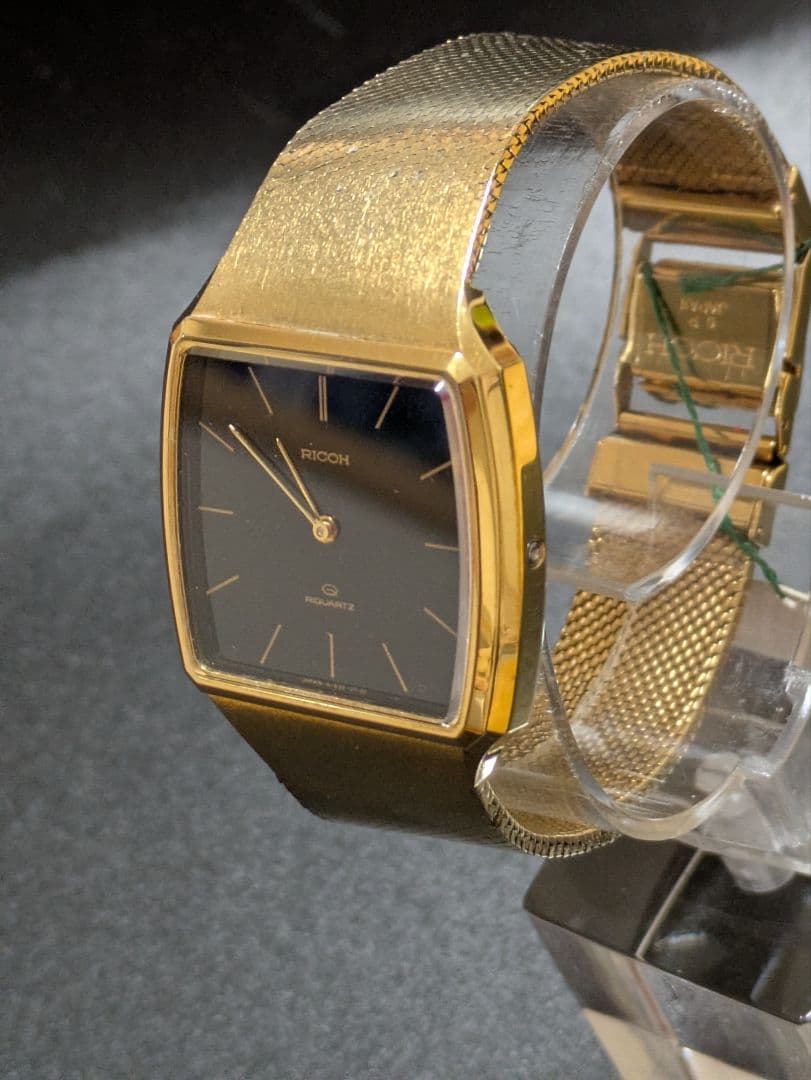 RICOH ブラック＆ ゴールド アンティーククォーツ腕時計