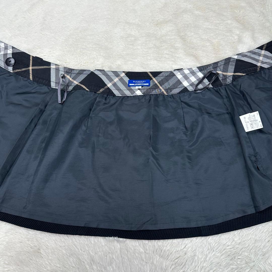 ✨美品✨バーバリーブルーレーベル ラップスカート 黒 ノバチェック ホース刺繍