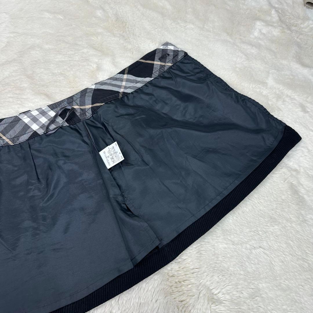 ✨美品✨バーバリーブルーレーベル ラップスカート 黒 ノバチェック ホース刺繍