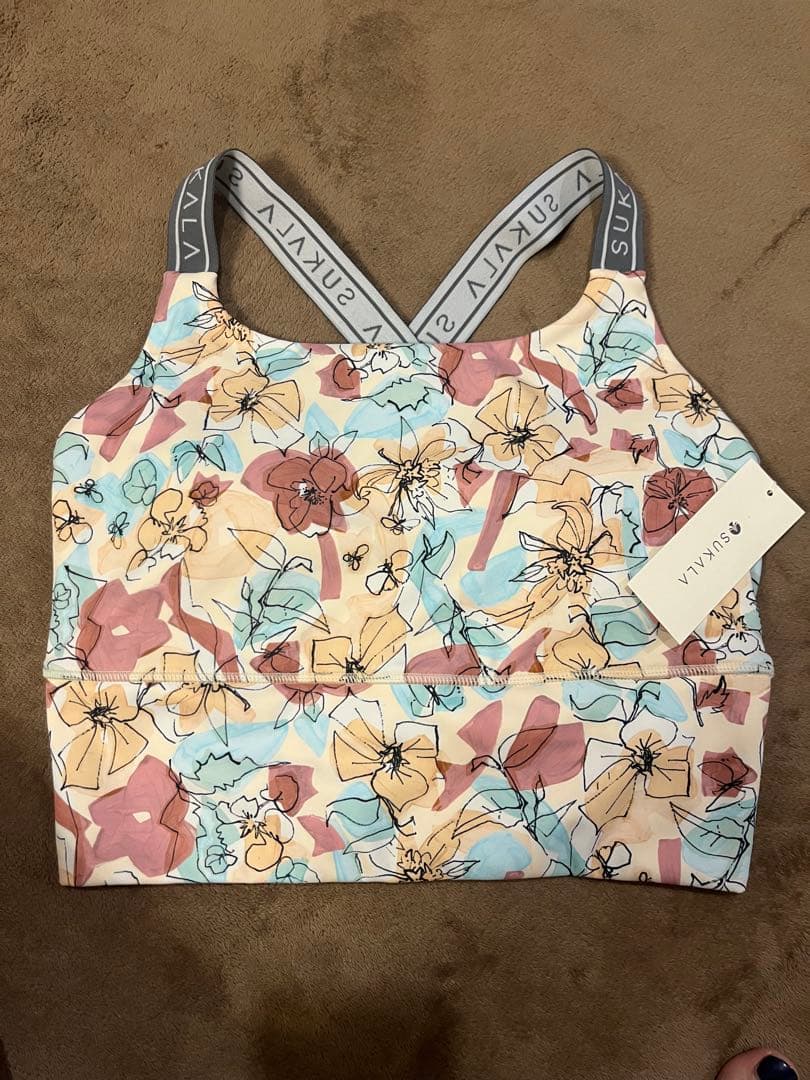 【SUKALA】2025年新作！【新品】ミックスフラワークロスロゴブラトップ！