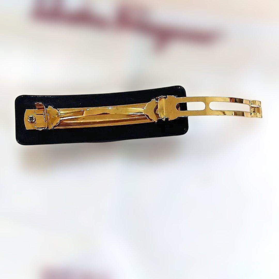 サルバトーレ・フェラガモ　 リボン型ヘアクリップ 黒金