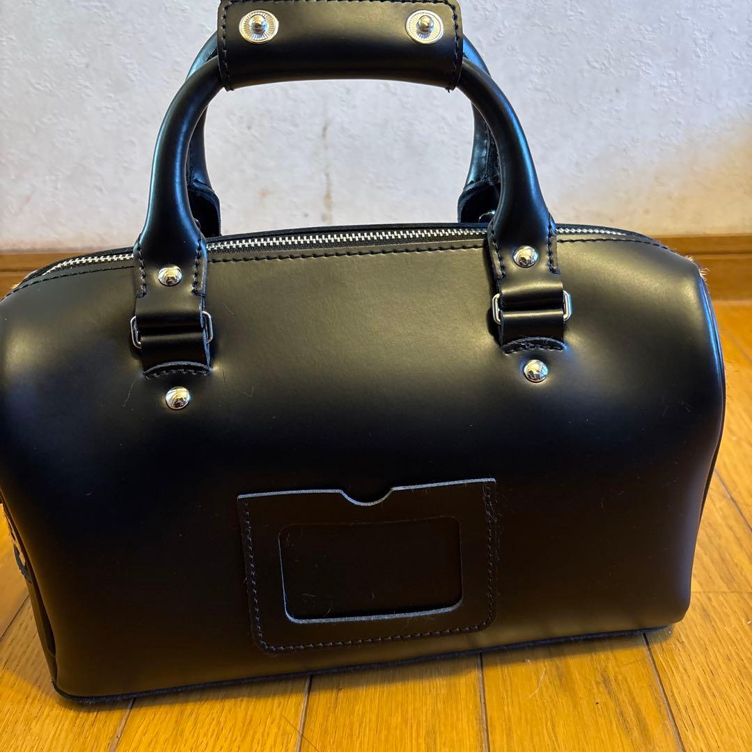 Dr.Martens レオパード柄ヘアオンレザートップハンドルバッグ