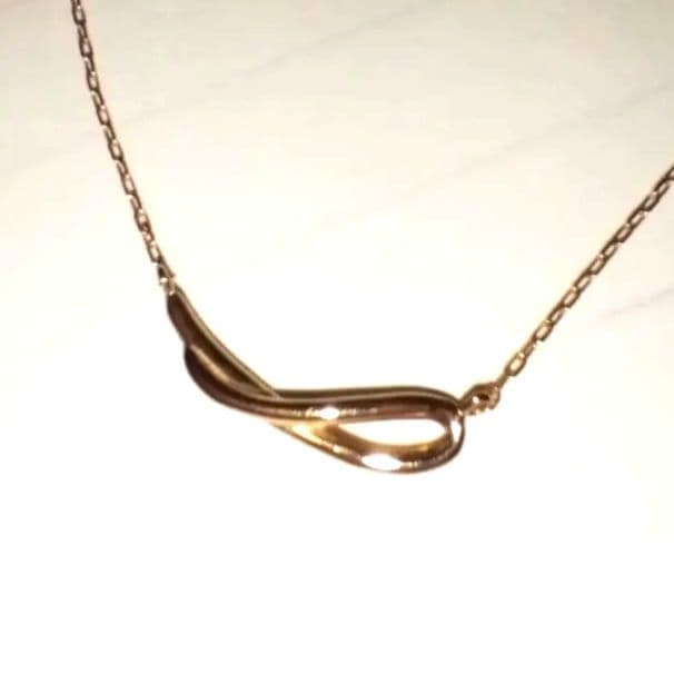 カナル4℃　ウェーブラインネックレス　K18 装飾ダイヤモンド